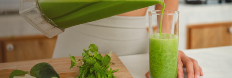 Pouring green smoothie