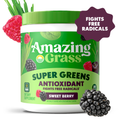 Container of Amazing Grass Super Greens Antioxidant supplement with berries and grass on a white background