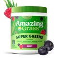 Amazing Grass Super Greens supplement container with berries on a white background