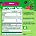 Supplement facts label for a berry-flavored supplement on a green background with berries and grass.