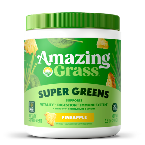 Amazing Grass Super Greens supplement container with green lid and label on a white background