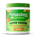 Amazing Grass Super Greens supplement container with tangerine flavor on a white background