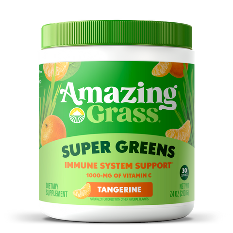 Amazing Grass Super Greens supplement container with tangerine flavor on a white background